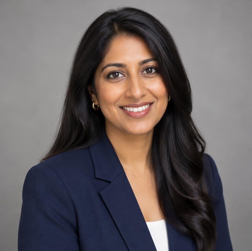 Portrait of a smiling woman with long dark hair
